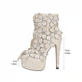 Glam White Ankle Boots with 3D Floral Embellishments & Pearl Platform
